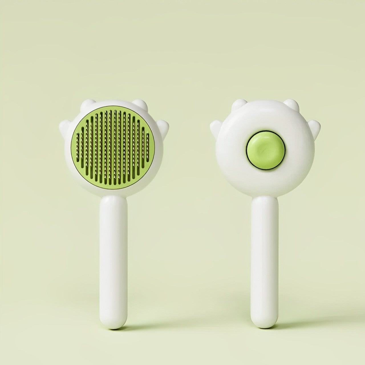Cat hair brush from different angles, with light green handles and bright green bristles.