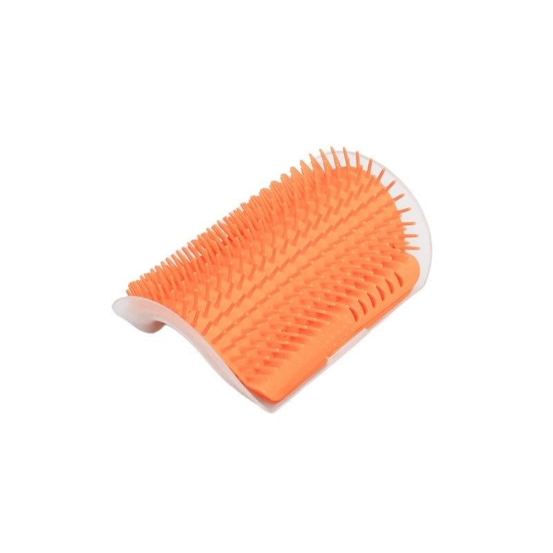 Orange grooming brush on a white background