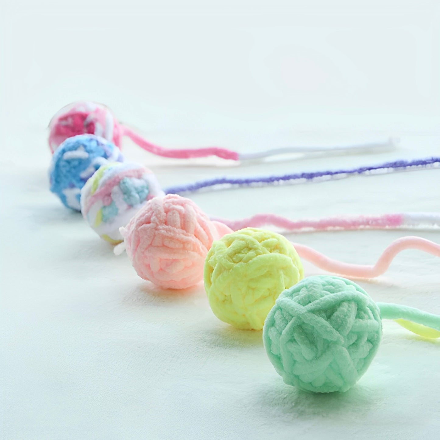 Six different colors of yarn balls