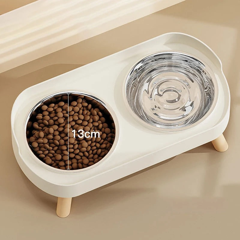White pet feeding station with two bowls on a beige surface showing size of the bowl
