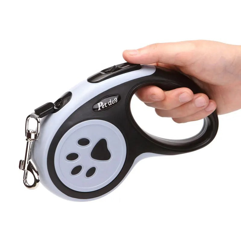 Hand holding a retractable dog leash with 'P-Relay' branding on a white background