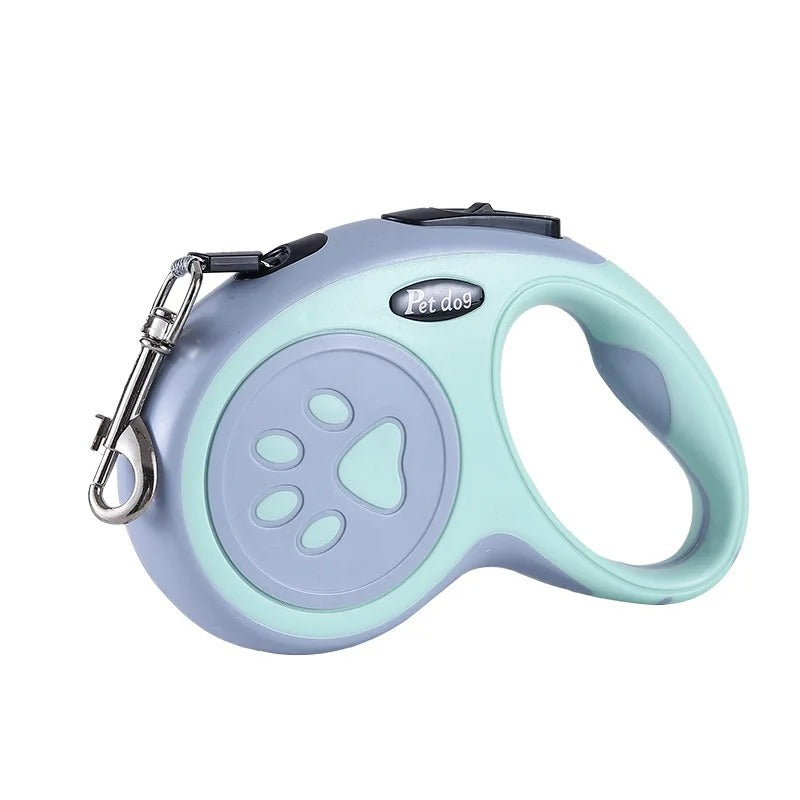 Retractable dog leash with a handle and keychain on a white background