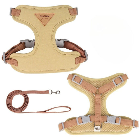 Beige cat harness and leash set on a white background