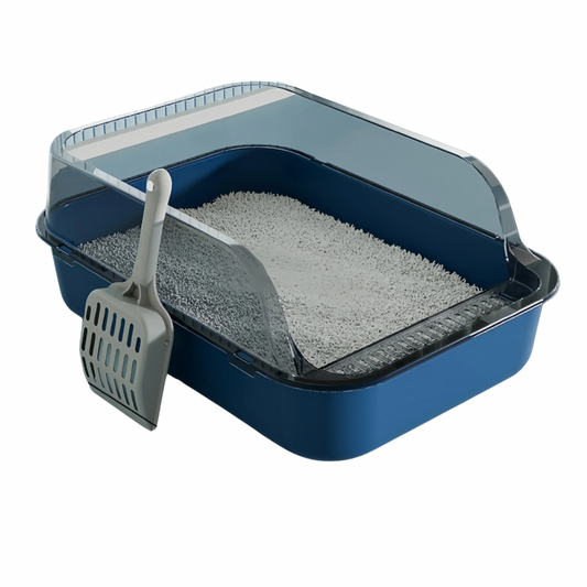 A blue cat litter tray with an open top and a gray scoop, filled with cat litter.