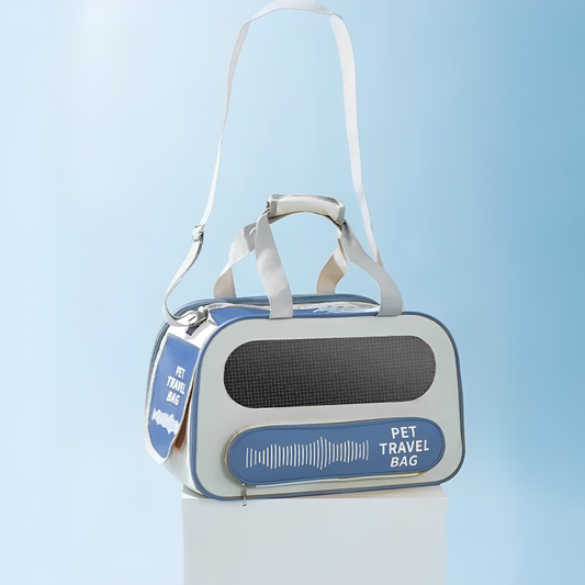 A pet carrier bag with breathable mesh panels in blue color with a light blue background.