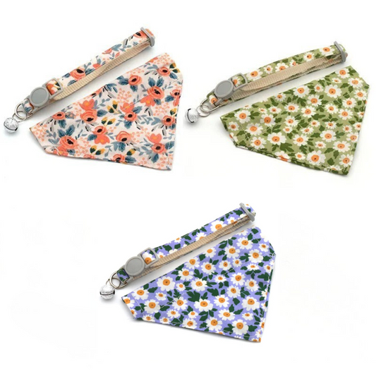 Four floral-patterned dog collars on a white background