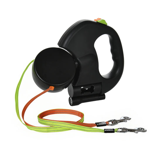Black retractable dog leash with green and orange strap on a white background