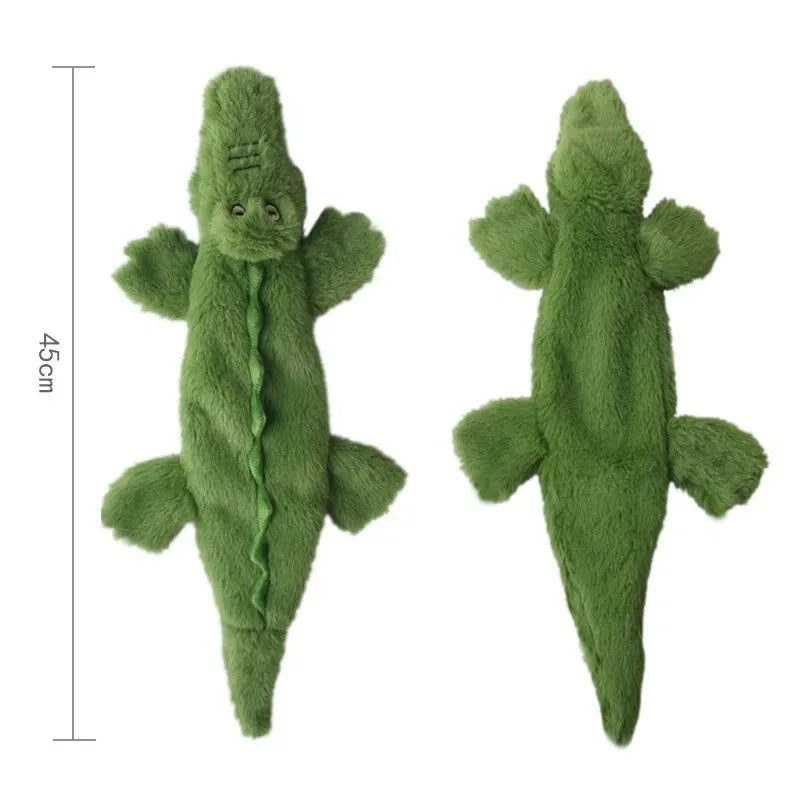 Two green plush crocodile toys with measurements on a white background