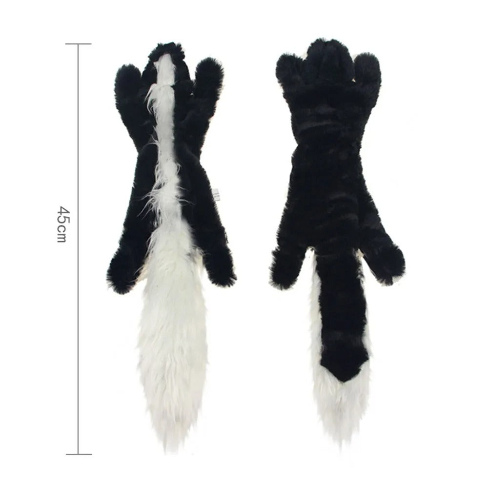 Black and white plush toy resembling skunk feet with measurement details on a white background