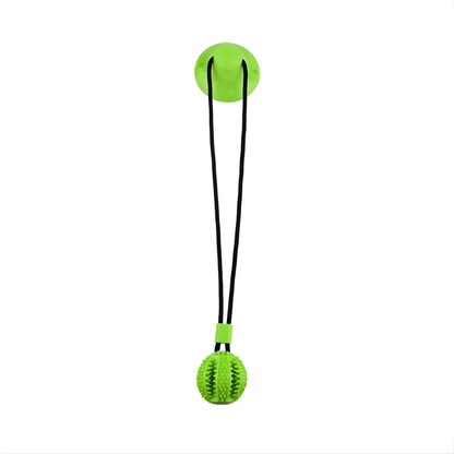 Green ball with a black string on a white background