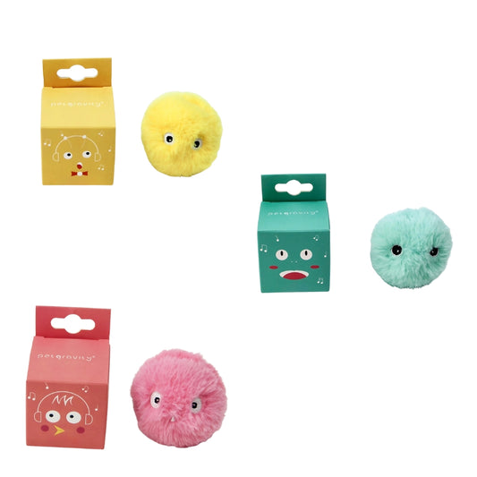 Three colorful plush balls with facial expressions in front of their packaging on a white background