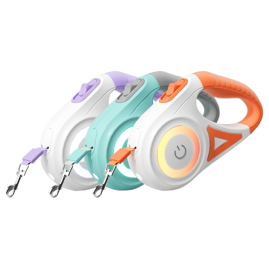 Three colorful retractable dog leashes on a white background