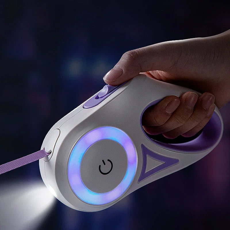 Hand holding a futuristic remote control device with glowing elements against a dark background