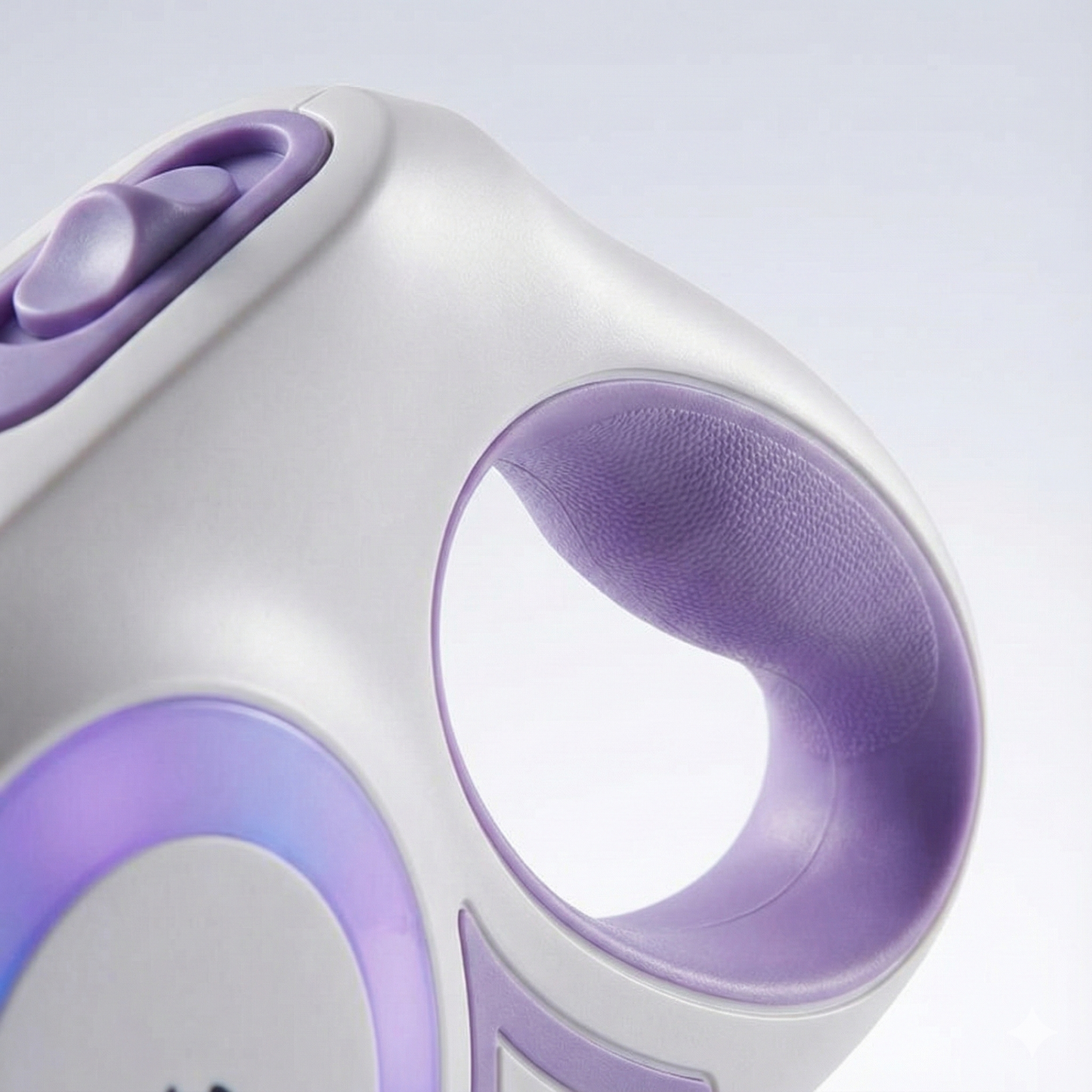Close-up of a white and purple electronic device on a light gray background
