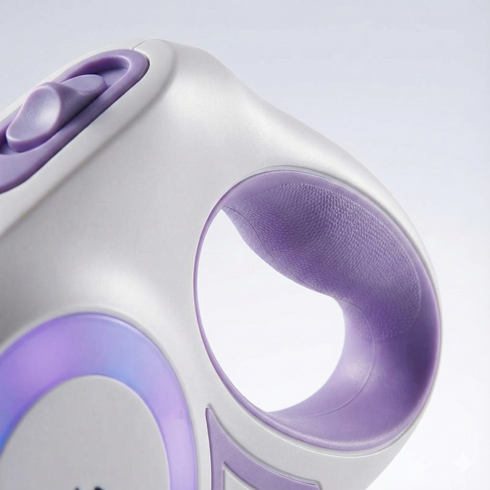 Close-up of a white and purple electronic device on a light gray background