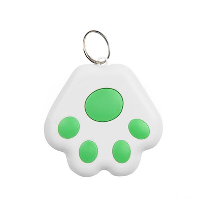 A white and green mini GPS Bluetooth tracker device with a white background