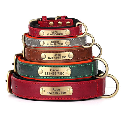 Stack of leather dog collars with engraved names and phone numbers on a white background