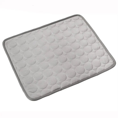 Grey cooling mat in a white background