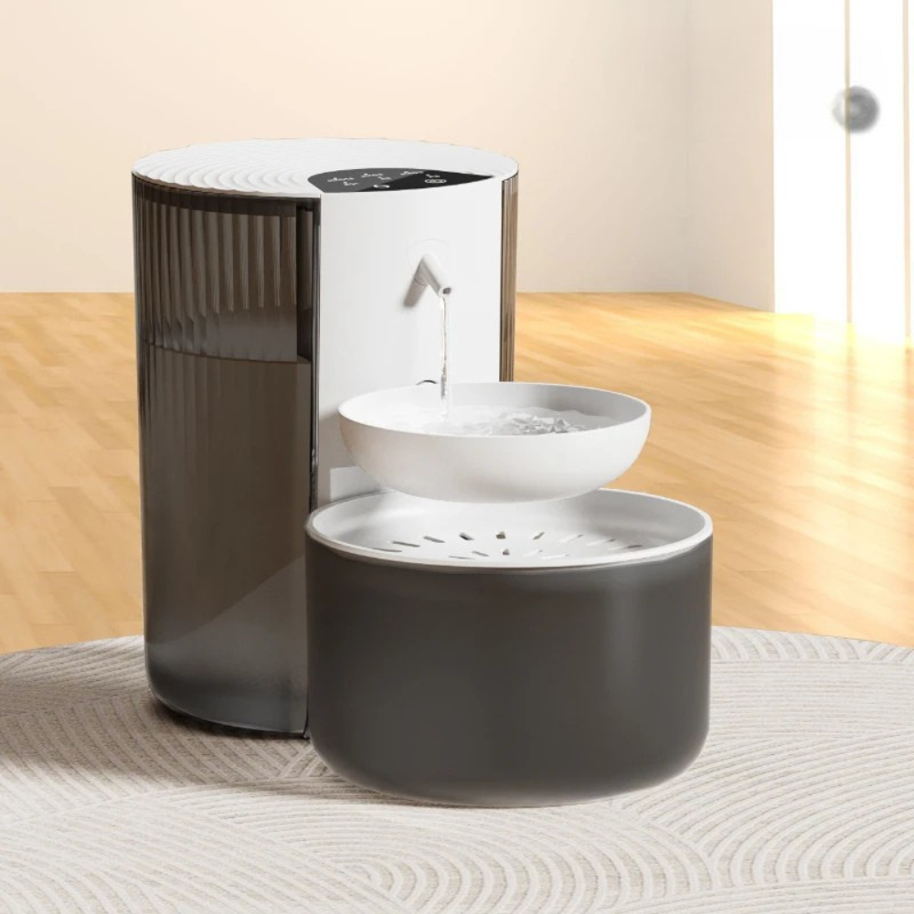 Modern pet water fountain on a textured surface with a neutral background