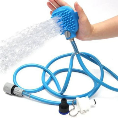 Blue flexible garden hose with a handheld shower head being used to spray water.