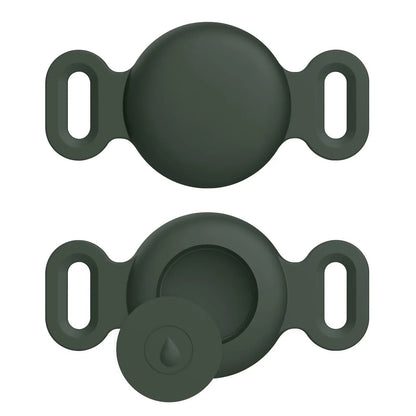 Two dark green silicone bottle caps on a white background