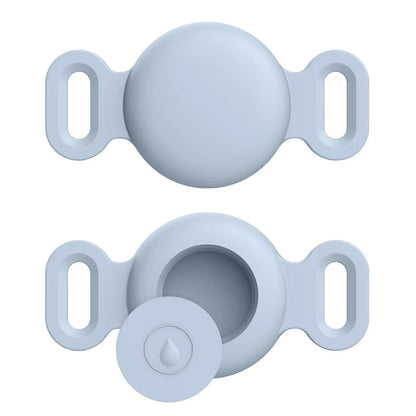 Two light blue silicone bottle caps on a white background