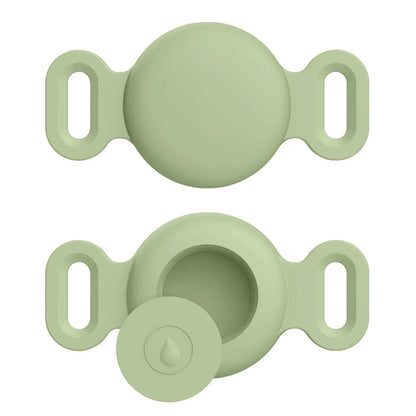 Two light green silicone clasps on a white background