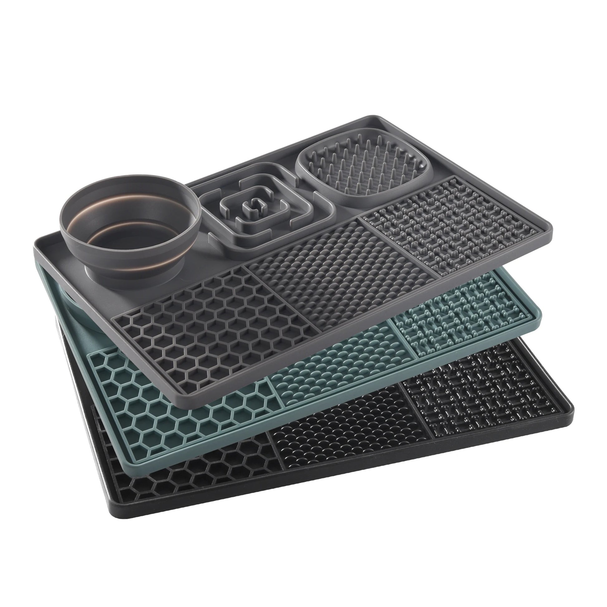 Set of three gray silicone mats with different patterns on a white background