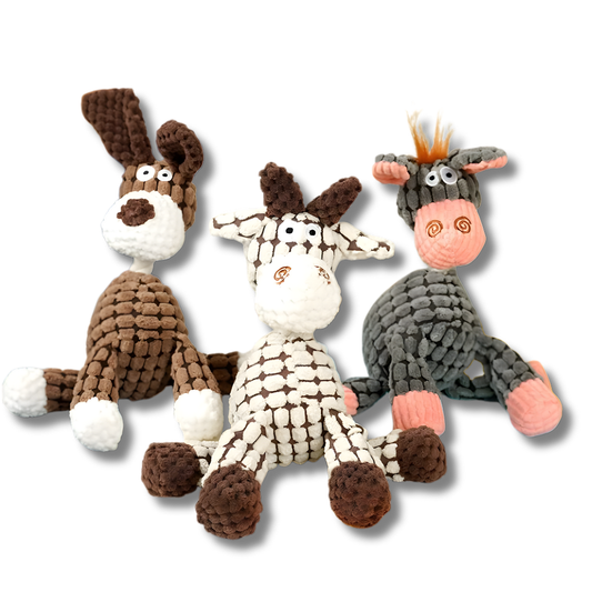 Three knitted donkey toys in different colors on a white background