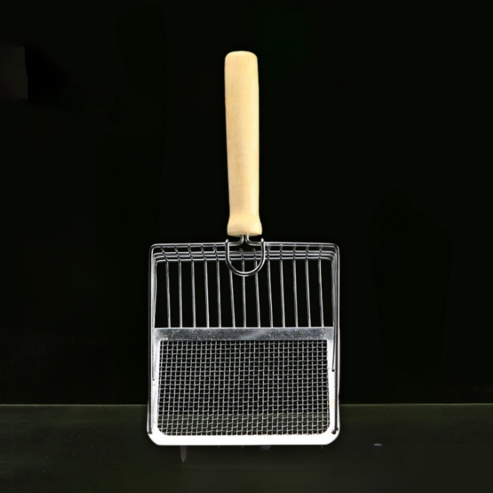 Stainless Steel with Wooden Handle Litter Scoop in a black background.