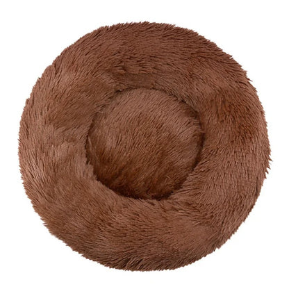 A brown plush round bed with a white background